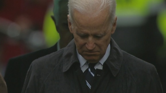 US Vice President Joe Biden observes the minute's silence at the memorial event.
