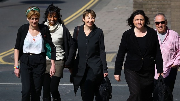 Green MP Caroline Lucas (centre) arrives with co-defendants and supporters at Brighton Magistrates Court in East Sussex