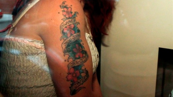 Mairead Philpott's tattoo with the names of her six dead children