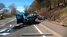 Family pulled to safety moments before car fire
