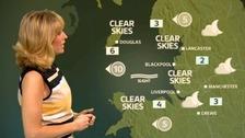 Emma Jesson in front of Granada weather map