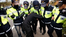 Anger as families clash with police over sunken ferry