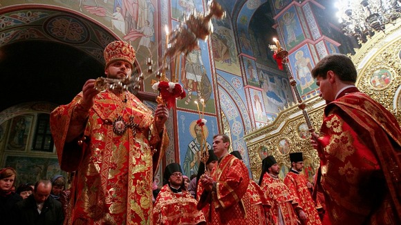 Ukrainian Orthodox priests conduct a holy liturgy during an Orthodox Easter service in Mikhailovsky Cathedral in Kiev.