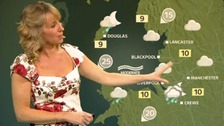 Emma Jesson in front of weather map