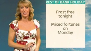 Emma Jesson in front of weather map
