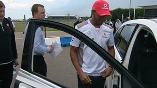 Lewis Hamilton giving safety tips to young drivers at Silverstone