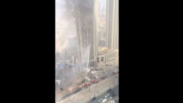 Firefighters tackle the blaze.