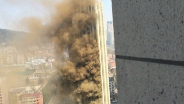 The fire was filmed from a building across the road.