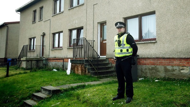 Police outside a property, after the death of a two-year-old.