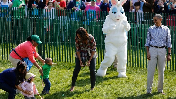First lady Michelle Obama having fun with visitors to the White House Easter Egg roll