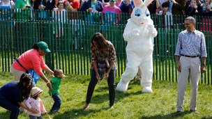 First lady Michelle Obama having fun with visitors to the White House Easter Egg roll