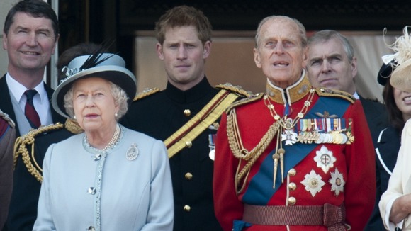 The Queen and Duke of Edinburgh with Prince Andrew and Prince Harry at Buckingham Palace after Trooping The Colour in London.