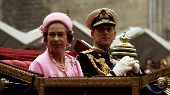 Queen Elizabeth II and the Duke of Edinburgh during a procession to celebrate the Silver Jubilee
