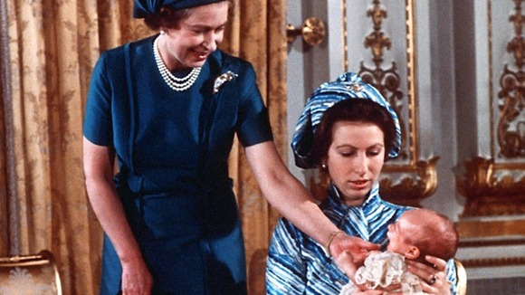The Queen with Princess Anne and her 37 day old son Peter Phillips, at Buckingham Palace, after his christening.