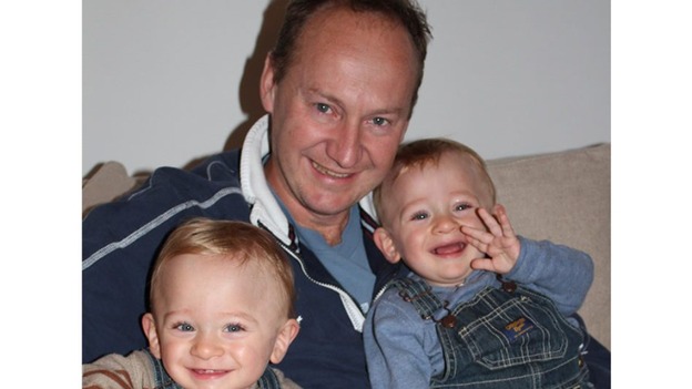 Gary Clarence pictured with his three-year-old twins.