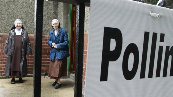 Carmelite nuns prepare to cast their vote in the European Fiscal Treaty Referendum at a polling station in north Dublin, Ireland.