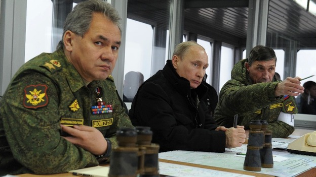 Russian Defence Minister Sergei Shoigu (left) has warned against Ukraine's recent use of force