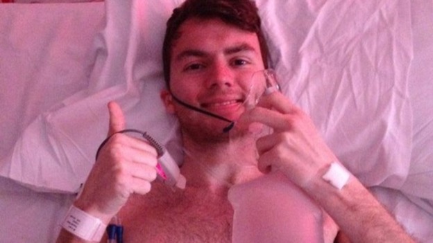 Stephen's picture of himself giving a thumbs up from his hospital bed