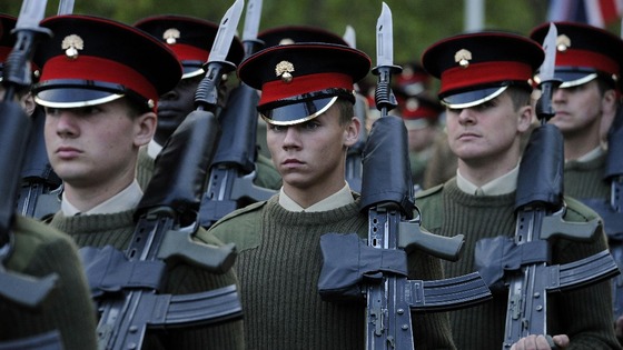Soldiers standing in line.