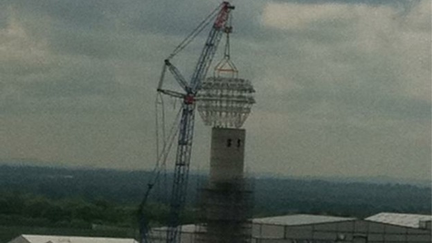 And the cap is almost in place...