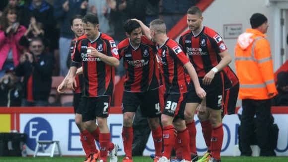 Surman celebrates scoring for Bournemouth.