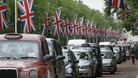 Cars in a queue of traffic.