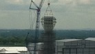 The cap is hoisted into place