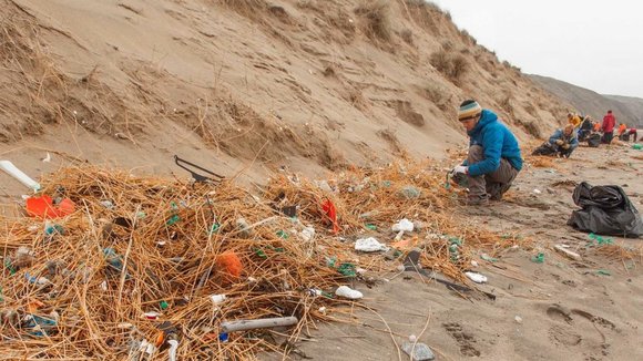 Rubbish that has been swirling around in the sea for decades was found on Britain's beaches in a Surfers Against Sewage clean-up.