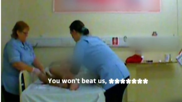 The two care home staff were secretly filmed physically and verbally abusing the patient.