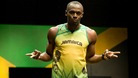 Jamaican sprinter Usain Bolt wearing the 2012 Jamaican Olympic kit during a photocall at Village Underground in London.
