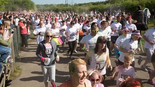 Runners covered in paint for charity