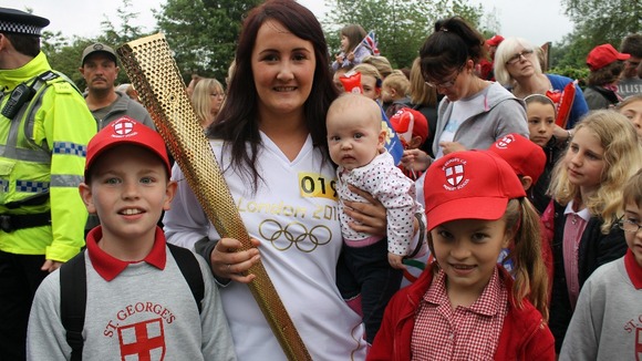 Mother with children and torch