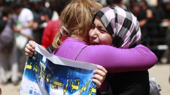 Emotional relatives of people who died during Egypt's revolution