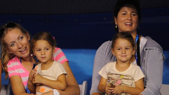 Roger Federer's wife Mirka Vavrinec (right) with their twin daughters Myla and Charlene.