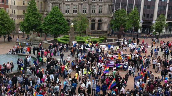 People gather in Victoria Square in Birmingham ahead of the parade