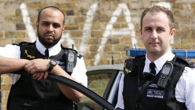 Constable Yasa Amerat (left) and Constable Craig Pearson wear their body-worn video (BWV) cameras.