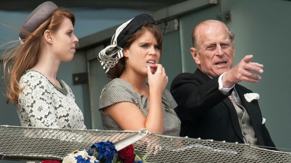 Princess Beatrice, Princess Eugenie and the Duke of Edinburgh, during the second day of the Epsom Derby horse racing festival