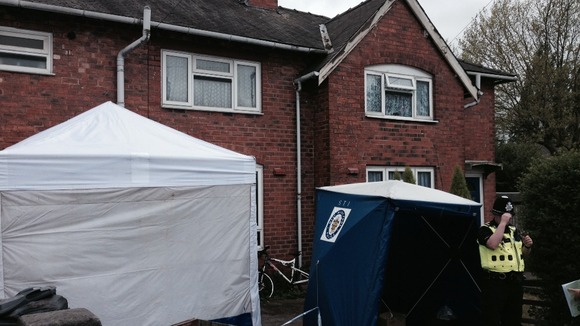The house where their bodies were discovered