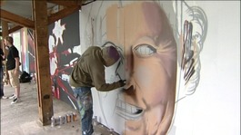 graffiti artist painting Queen