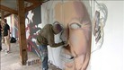 graffiti artist painting Queen