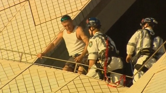 The man was fitted with a harness before being brought down from the sails.