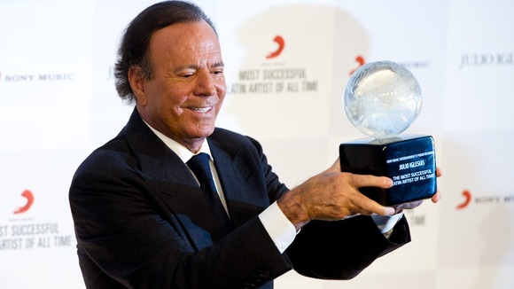 Julio Iglesias was honoured for his best-selling career in a ceremony at London's Dorchester Hotel