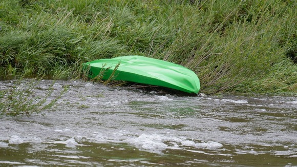 Rescuers found a kayak and two abandoned cars in their search for three kayakers who went missing last night