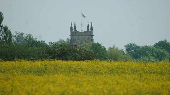 Church across field