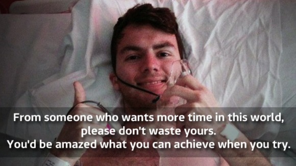 Stephen Sutton giving a thumbs up in his hospital bed.
