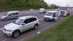 A wide shot of cars on motorway
