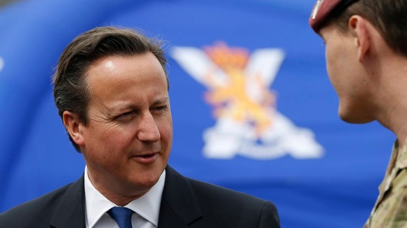 Prime Minister David Cameron meets members of the Armed Forces during his visit to the Walcheren Barracks in Glasgow.