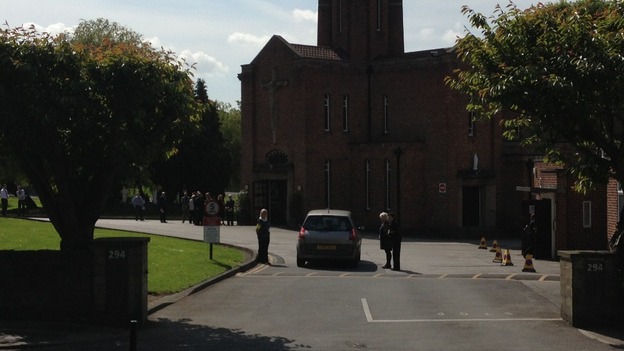 Mourners arrive for Ann Maguire's funeral