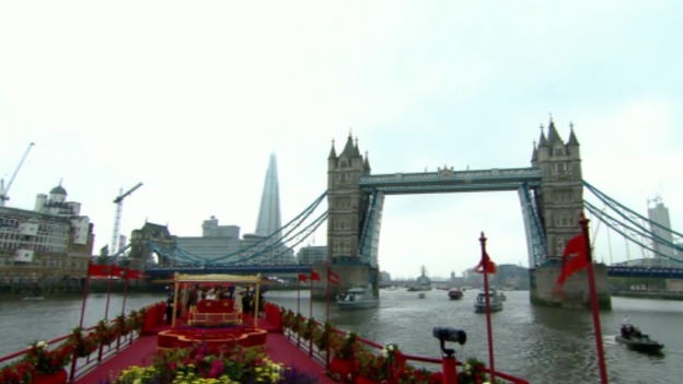 The Spirit of Chartwell carrying the Queen passes under Tower Bridge