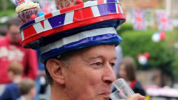 Man with union jack hat